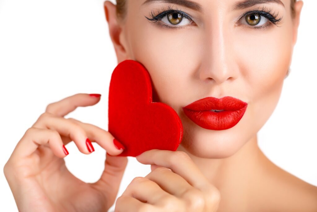 c beautiful woman bright makeup and red heart